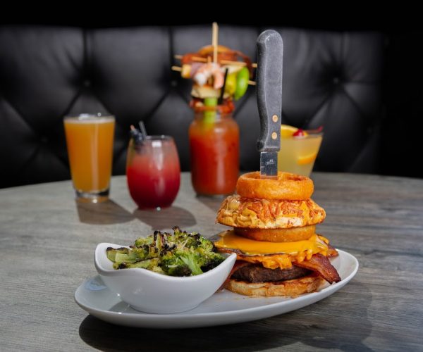 Food and drinks on top of table.